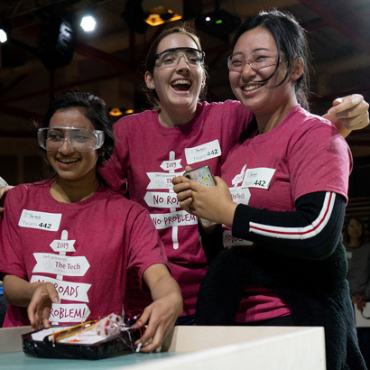 Girls celebrating during The Tech Challenge Final Showcase.